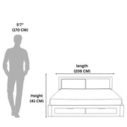 Bed dimensions shown with a standing person for scale on a white background