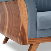 Wooden armchair with gray cushion on a white background