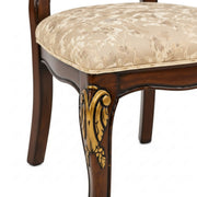 Bisaco gold-carved chair leg detail