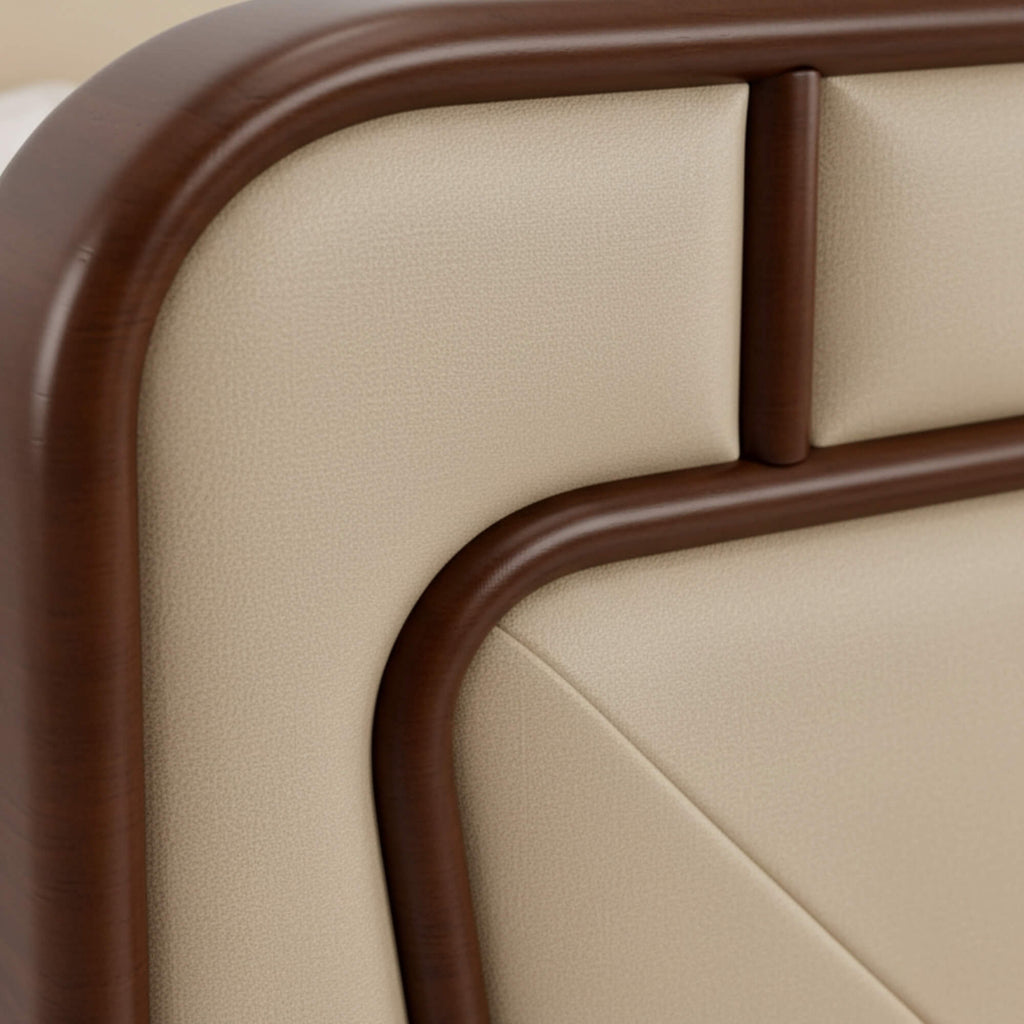 Close-up of a beige upholstered chair with brown wooden armrests.