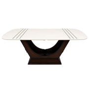 Conch marble dining table with conch-inspired arch base, front view