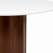 Drum marble top edge and fluted pedestal close-up