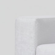 Gray upholstered chair corner