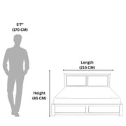 Diagram showing the dimensions of a bed with a person for scale.