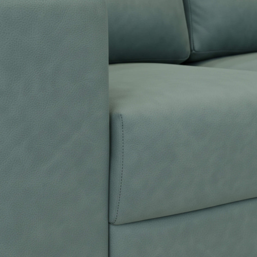 Pacific 2-seater Fabric’s soft fabric texture and detailed stitching is highlighted for added elegance and comfort.