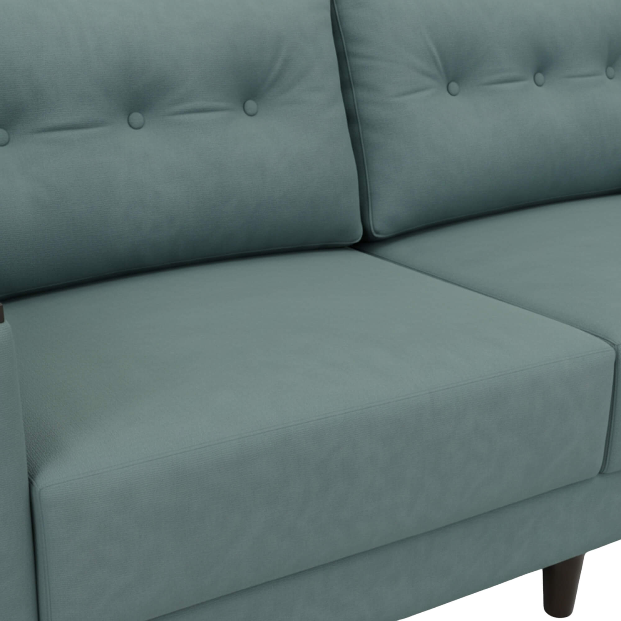 Pacific 3 Seater Sofa’s smooth upholstery and a sleek structured finish depict a clean and contemporary aesthetic.