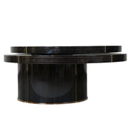 N302A Coffee Table’s design features a unique rotating multi-tiered top section shifted slightly to the side.