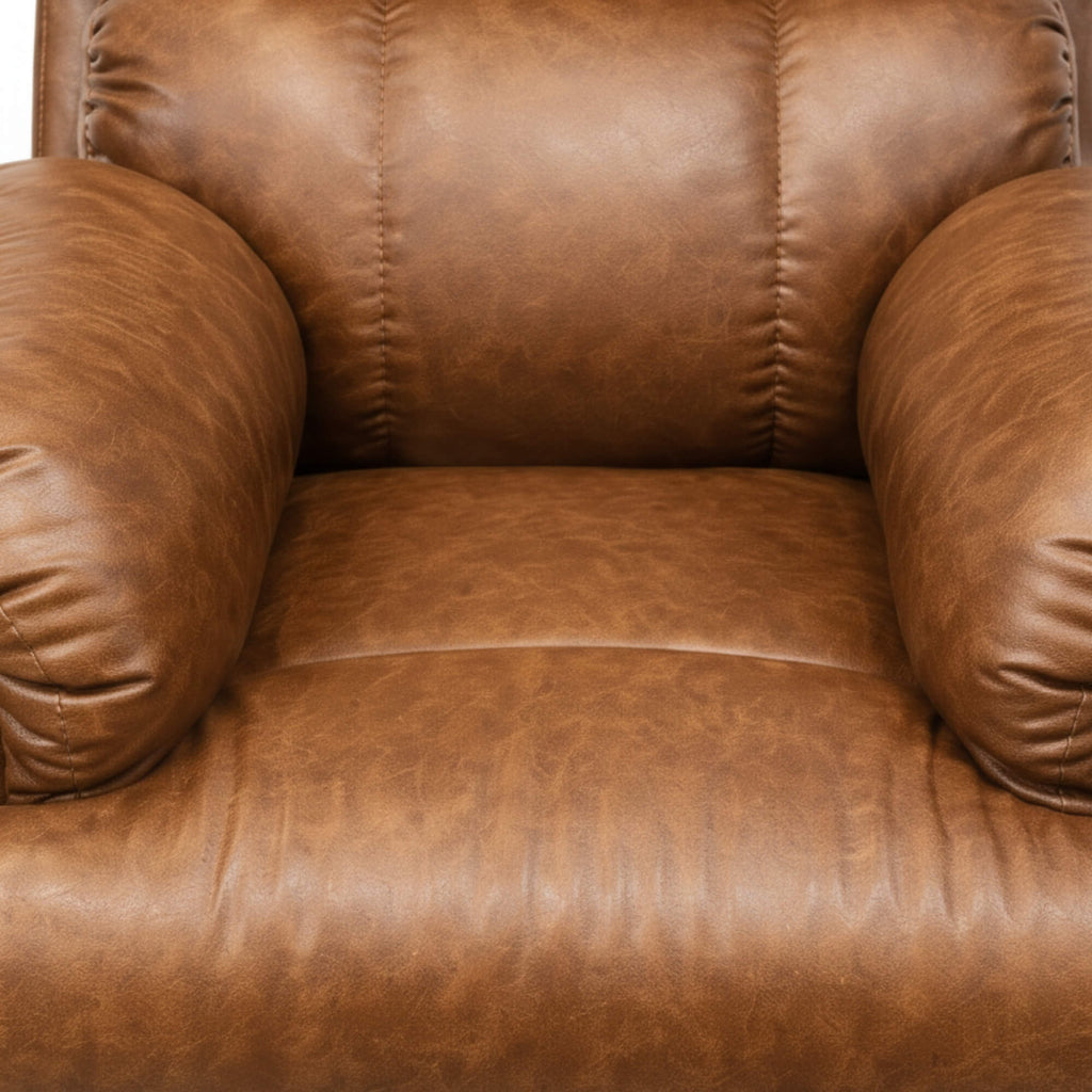 Tan brown leatherette recliner seat and stitching close-up | qivly:v1:h:bf4a0de3d36ae8aa42bd05eebfe6b375