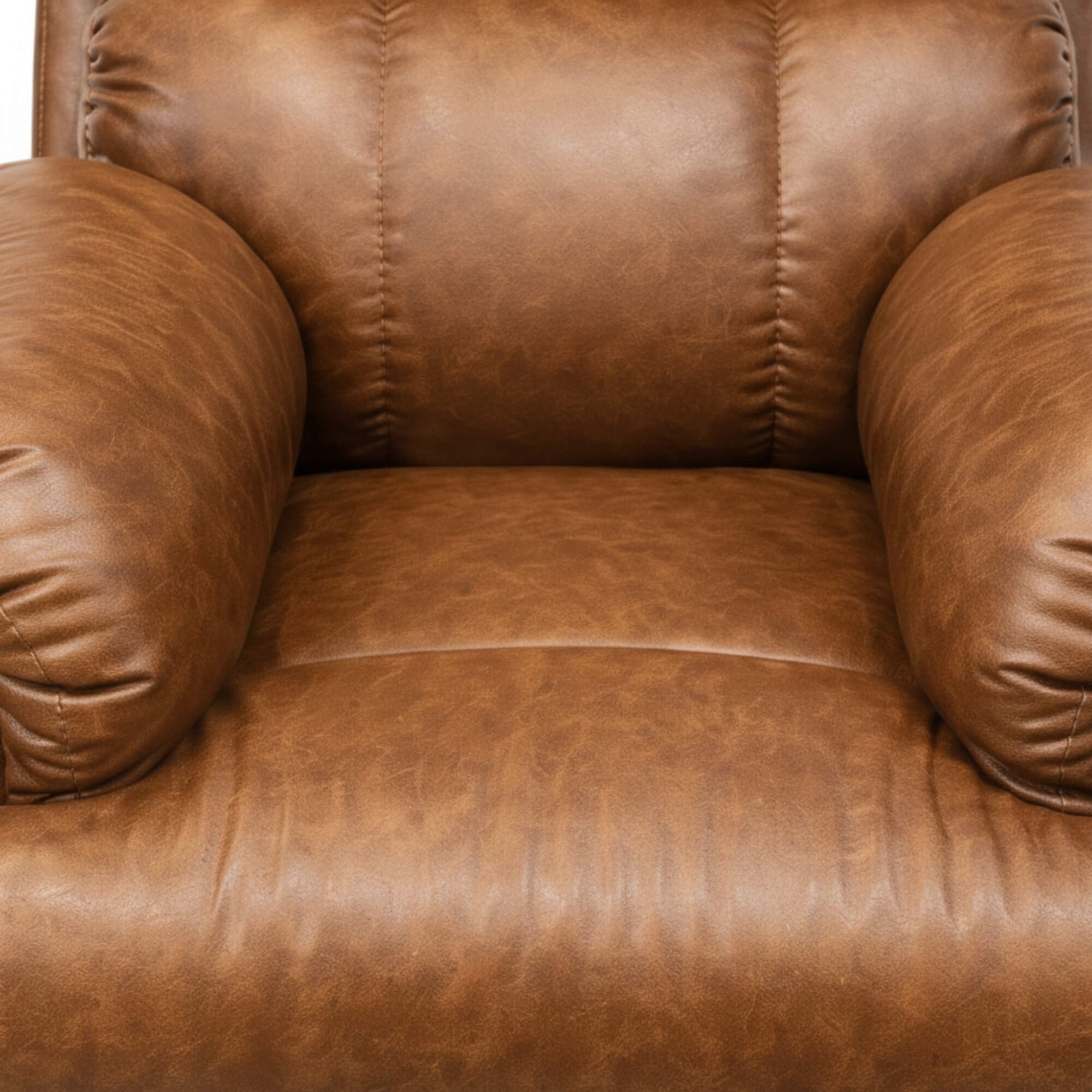 Tan brown leatherette recliner seat and stitching close-up | qivly:v1:h:bf4a0de3d36ae8aa42bd05eebfe6b375