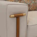 Lavish 3 Seater Sofa’s armrest corner with a stylish wooden accent support is exhibited.