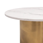 Oval Marble Coffee Table 821 presents a thin profile of the white marble tabletop and the heavy gold cylindrical legs.